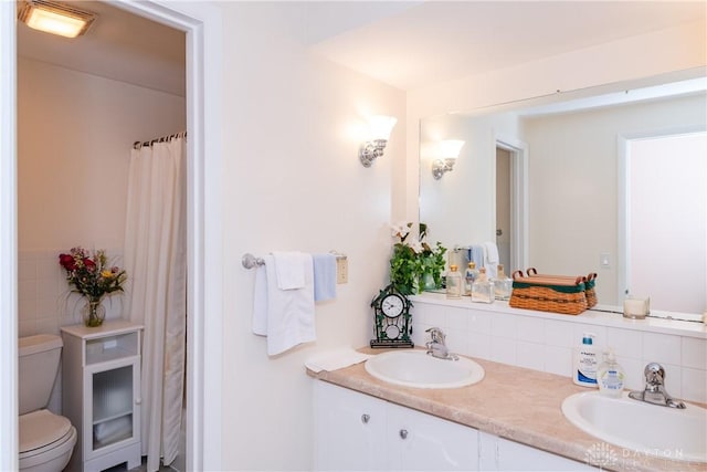 1269 Redbud Dr, Fairborn, OH 45324 - bathroom with double vanity and tasteful backsplash