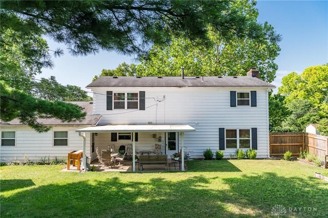 1269 Redbud Dr, Fairborn, OH 45324 - rear view of property featuring a chimney and a patio area
