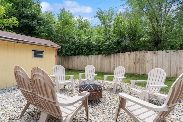 5433 Pentland Cir, Huber Heights, OH 45424 - view of patio / terrace with a fire pit