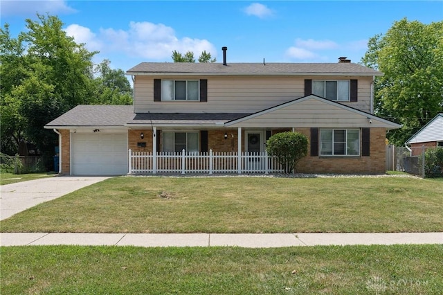 5433 Pentland Cir, Huber Heights, OH 45424 - traditional-style home featuring brick siding, an attached garage, concrete driveway, a chimney, and covered porch