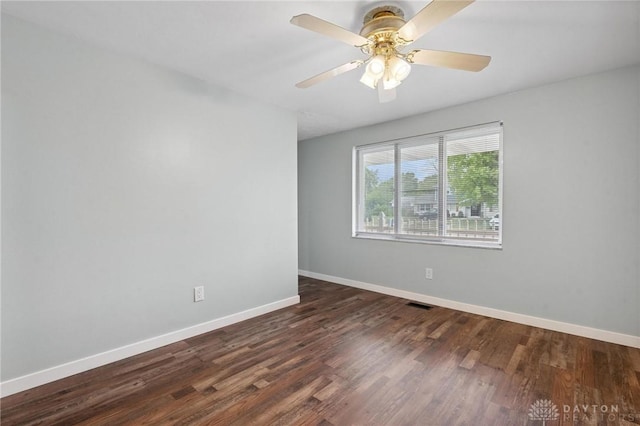5433 Pentland Cir, Huber Heights, OH 45424 - empty room featuring dark wood-style floors and a ceiling fan