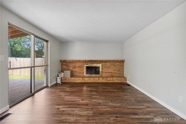 5433 Pentland Cir, Huber Heights, OH 45424 - unfurnished living room with wood finished floors and a fireplace