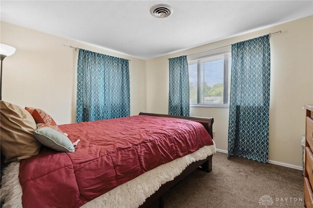 5433 Pentland Cir, Huber Heights, OH 45424 - carpeted bedroom featuring baseboards
