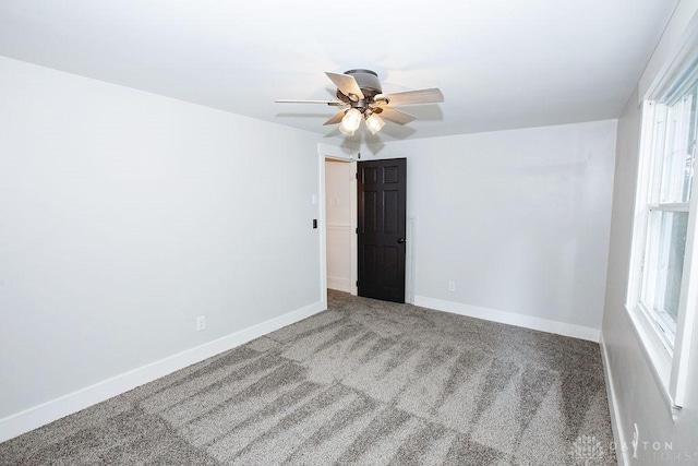 1151 Brookview Ave, Dayton, OH 45409 - unfurnished room with carpet, healthy amount of natural light, and a ceiling fan