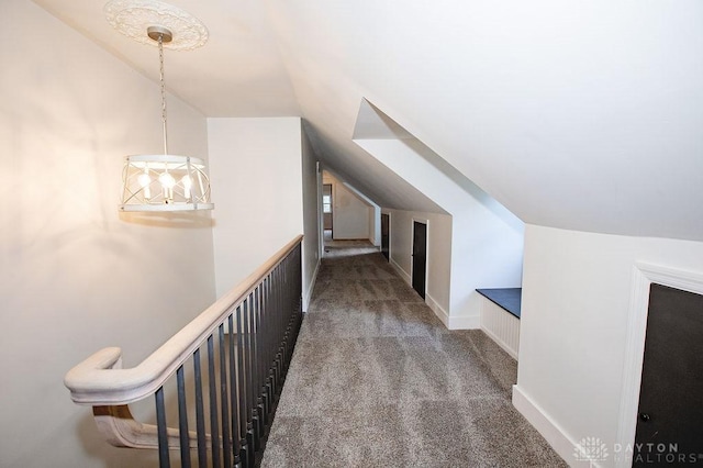 1151 Brookview Ave, Dayton, OH 45409 - corridor with carpet flooring, lofted ceiling, and a chandelier
