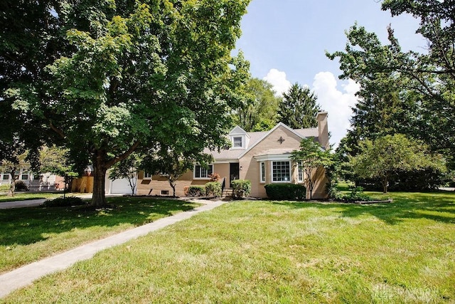 1151 Brookview Ave, Dayton, OH 45409 - view of front of home featuring a chimney and a front lawn