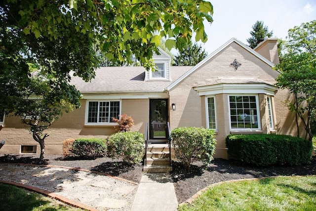 1151 Brookview Ave, Dayton, OH 45409 - view of front of home featuring brick siding and roof with shingles