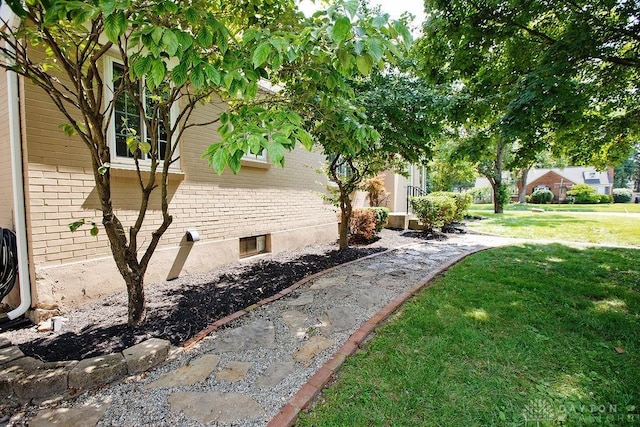 1151 Brookview Ave, Dayton, OH 45409 - view of home's exterior featuring brick siding and a lawn