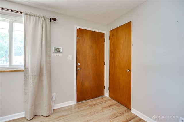 57 Pollyanna Ave, Germantown, OH 45327 - foyer featuring light wood-style flooring and baseboards