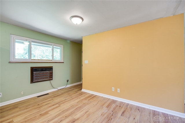 57 Pollyanna Ave, Germantown, OH 45327 - spare room with a wall mounted air conditioner and light wood finished floors