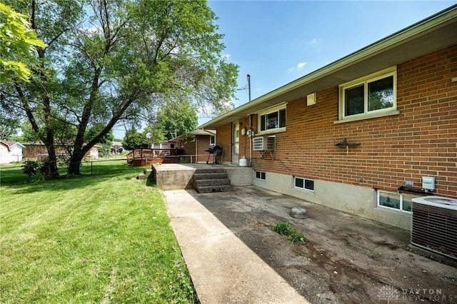 57 Pollyanna Ave, Germantown, OH 45327 - view of green lawn featuring a patio