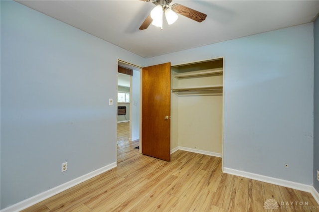 57 Pollyanna Ave, Germantown, OH 45327 - unfurnished bedroom with light wood-type flooring, a closet, and ceiling fan