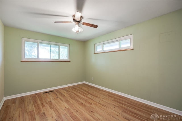 57 Pollyanna Ave, Germantown, OH 45327 - empty room featuring light wood-style flooring and ceiling fan