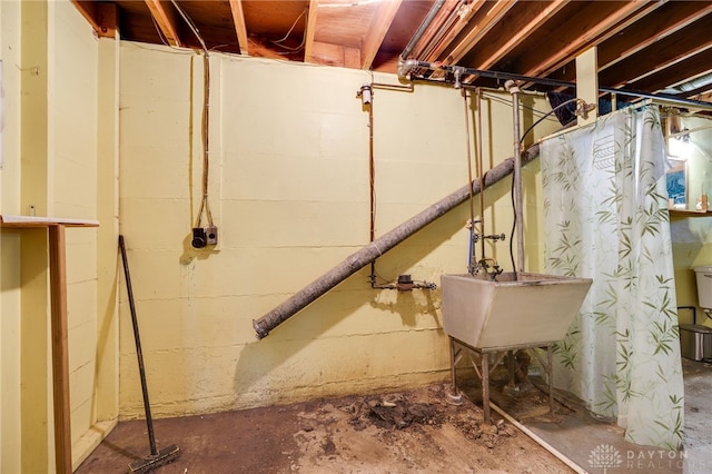 57 Pollyanna Ave, Germantown, OH 45327 - unfinished basement featuring a sink