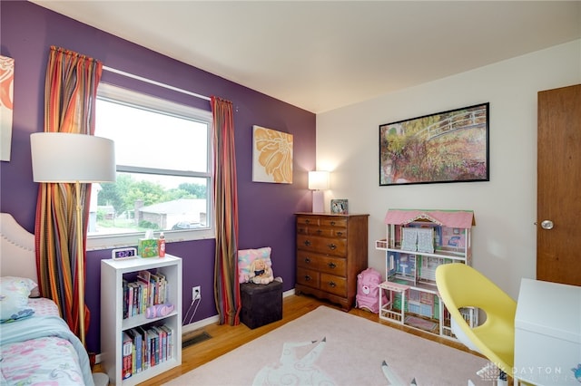 338 Chatham Dr, Fairborn, OH 45324 - bedroom featuring wood finished floors and baseboards