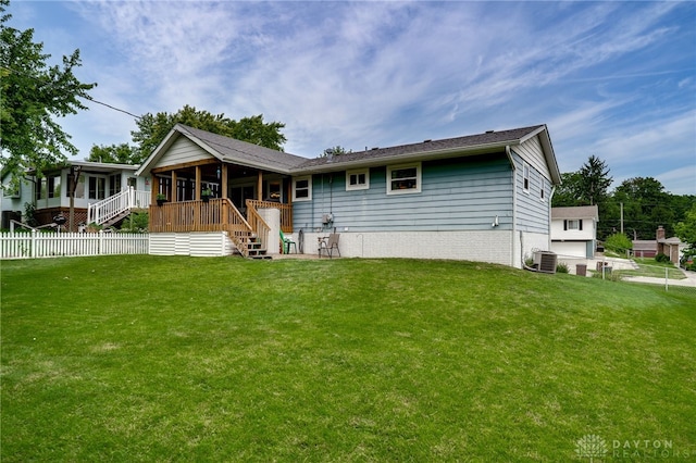 338 Chatham Dr, Fairborn, OH 45324 - rear view of house with a sunroom and stairway