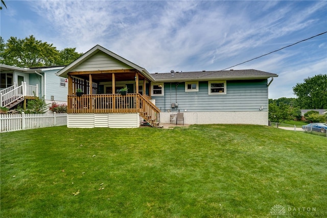 338 Chatham Dr, Fairborn, OH 45324 - back of house featuring a sunroom and stairway