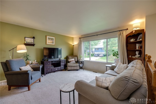 338 Chatham Dr, Fairborn, OH 45324 - living area featuring light carpet and baseboards