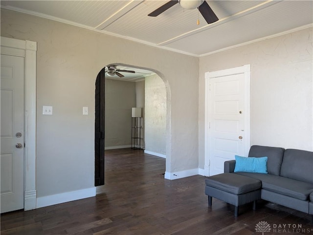 633 Taylor St, Dayton, OH 45404 - living area with a ceiling fan, arched walkways, and dark wood-style flooring