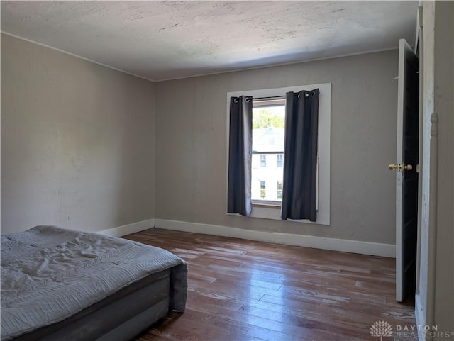 633 Taylor St, Dayton, OH 45404 - bedroom with wood-type flooring