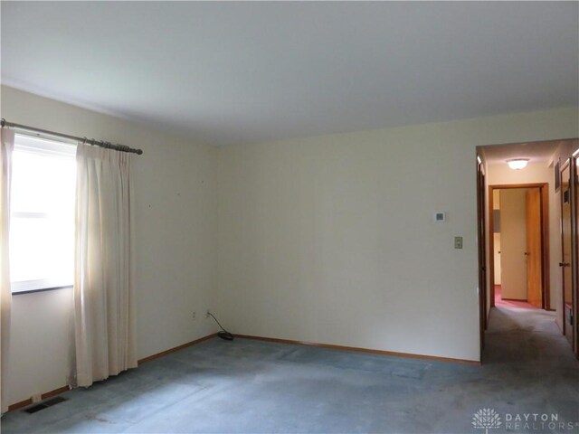2830 Kennedy Ave, Dayton, OH 45420 - empty room with light carpet and baseboards