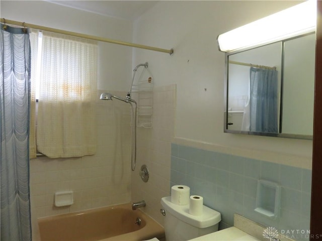 2830 Kennedy Ave, Dayton, OH 45420 - bathroom featuring shower / bath combination with curtain, tile walls, vanity, and wainscoting