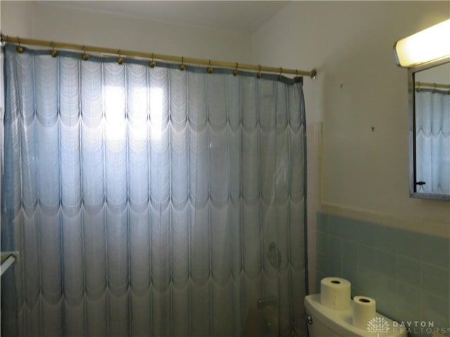 2830 Kennedy Ave, Dayton, OH 45420 - full bath with a wainscoted wall and toilet