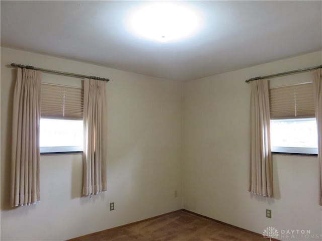 2830 Kennedy Ave, Dayton, OH 45420 - carpeted empty room featuring plenty of natural light