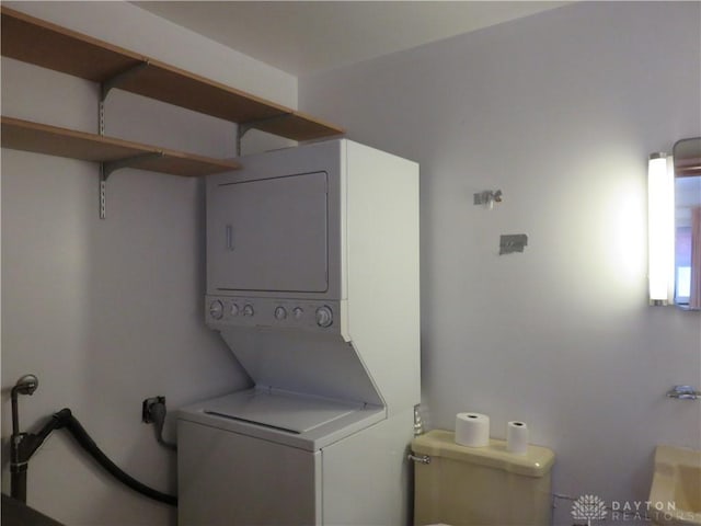 2830 Kennedy Ave, Dayton, OH 45420 - washroom featuring stacked washer and clothes dryer