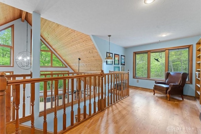 10370 Old 3c Hwy, Clarksville, OH 45113 - hallway with an upstairs landing, wood finished floors, a chandelier, lofted ceiling, and recessed lighting