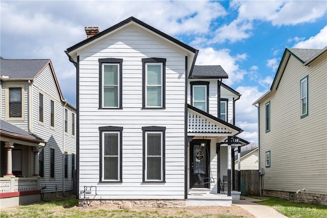 130 Mound St, Dayton, OH 45402 - view of front of property with a porch and a chimney