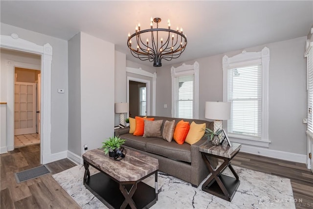 130 Mound St, Dayton, OH 45402 - living area featuring a chandelier and wood finished floors