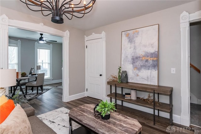 130 Mound St, Dayton, OH 45402 - living area with a chandelier, wood finished floors, and ceiling fan