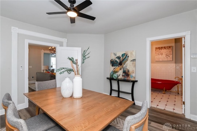 130 Mound St, Dayton, OH 45402 - dining room with a chandelier, ceiling fan, and wood finished floors