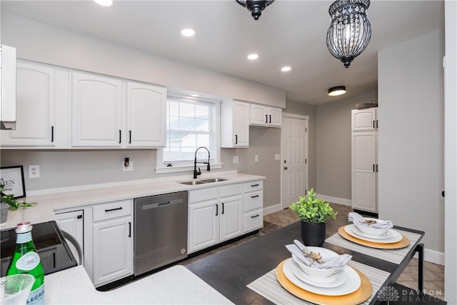130 Mound St, Dayton, OH 45402 - kitchen featuring dishwasher, range, white cabinetry, light countertops, and recessed lighting