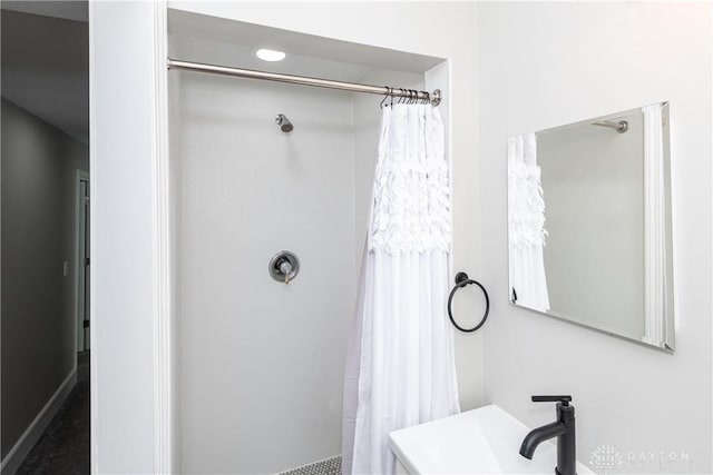 130 Mound St, Dayton, OH 45402 - bathroom with curtained shower and a sink