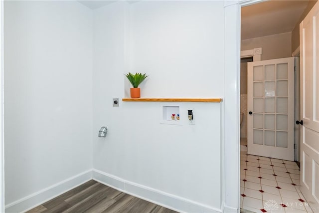 130 Mound St, Dayton, OH 45402 - washroom with hookup for an electric dryer, washer hookup, and wood finished floors