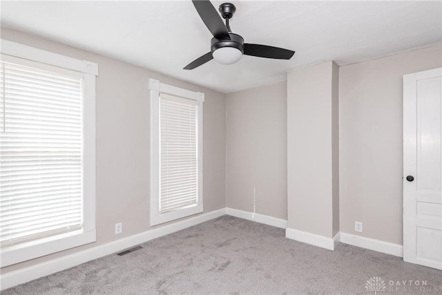 130 Mound St, Dayton, OH 45402 - unfurnished bedroom featuring carpet and a ceiling fan