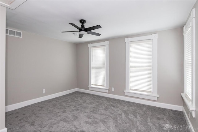 130 Mound St, Dayton, OH 45402 - spare room featuring carpet floors and a ceiling fan