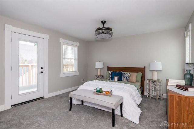 130 Mound St, Dayton, OH 45402 - bedroom with dark colored carpet and access to exterior