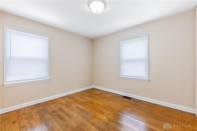 349 E Xenia Dr, Fairborn, OH 45324 - unfurnished room featuring baseboards and hardwood / wood-style flooring