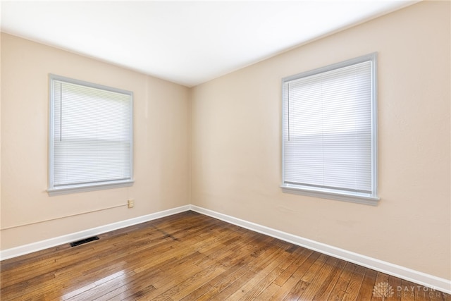 349 E Xenia Dr, Fairborn, OH 45324 - spare room featuring baseboards and wood-type flooring