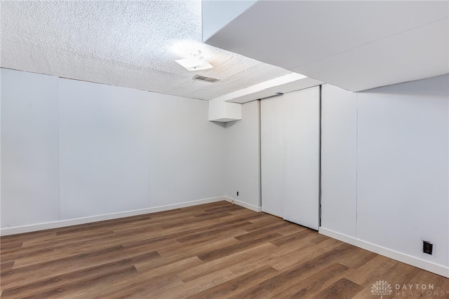 349 E Xenia Dr, Fairborn, OH 45324 - additional living space with wood finished floors and a textured ceiling