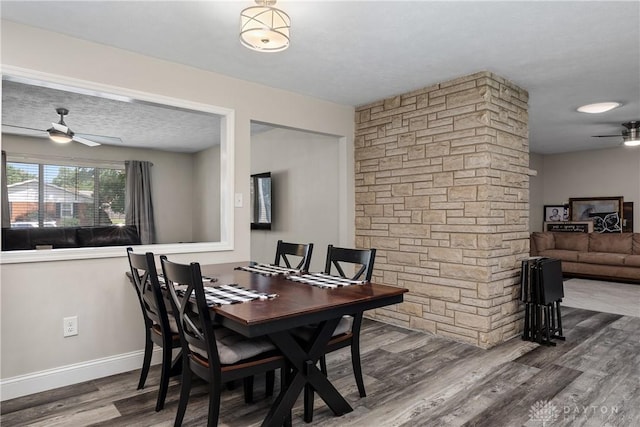 670 Saxony Dr, Xenia, OH 45385 - dining space featuring ceiling fan and wood finished floors