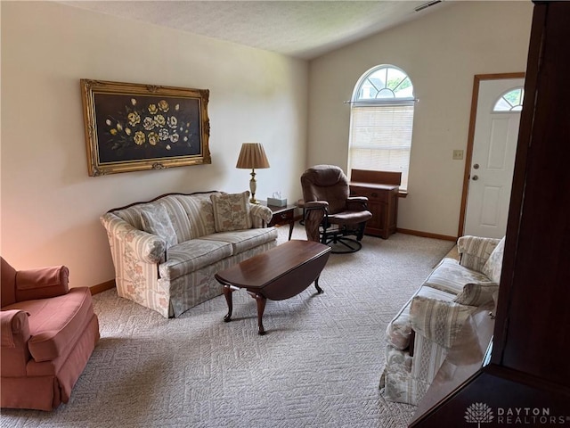 3509 Brian Ct, Middletown, OH 45044 - carpeted living room with vaulted ceiling and baseboards