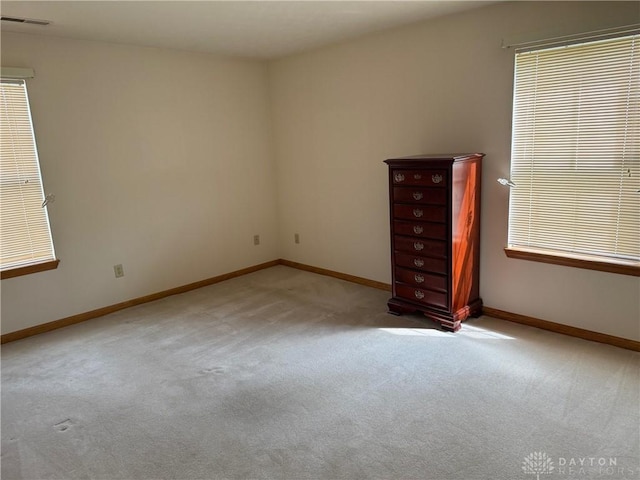 3509 Brian Ct, Middletown, OH 45044 - unfurnished bedroom featuring carpet flooring and multiple windows
