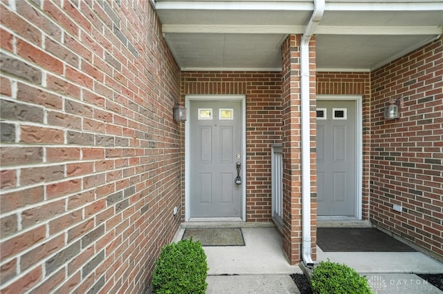 9266 Great Lakes Cir, Washington Twp, OH 45458 - doorway to property featuring brick siding