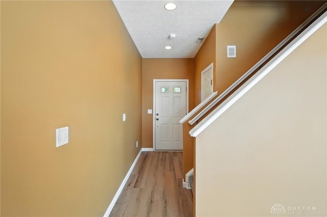 9266 Great Lakes Cir, Washington Twp, OH 45458 - entryway with stairway, light wood-style floors, and recessed lighting
