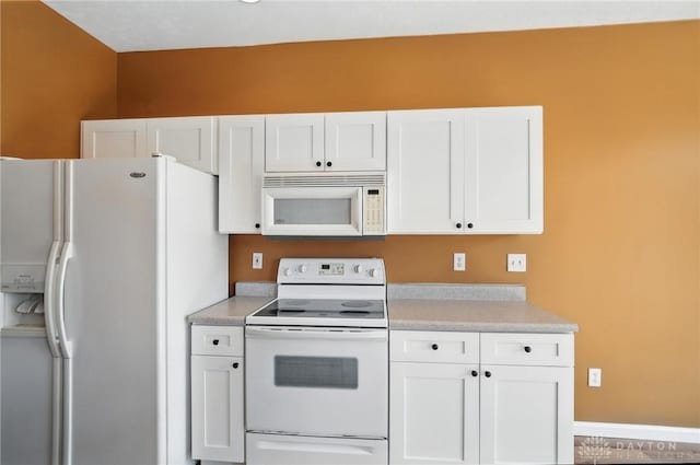 9266 Great Lakes Cir, Washington Twp, OH 45458 - kitchen featuring white appliances, light countertops, and white cabinets