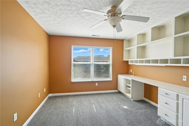 9266 Great Lakes Cir, Washington Twp, OH 45458 - unfurnished bedroom with dark carpet, a textured ceiling, and a ceiling fan